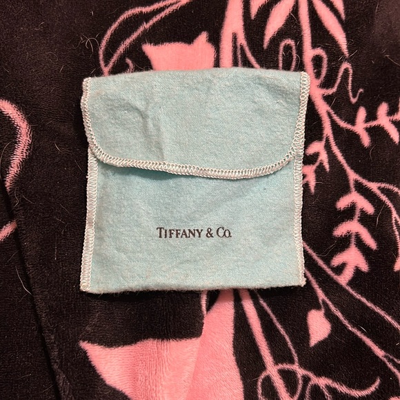 Tiffany & Co. Handbags - Tiffany and Co mini pouch (EUC)